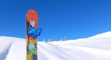 snowboard in the snow