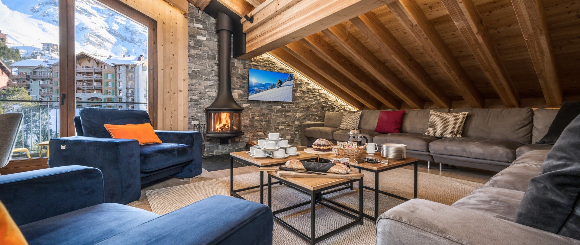 Afternoon tea in front of a log fire in Penthouse Misha, Arcs 1950