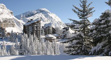 Snowy view of Avoriaz apartment blocks