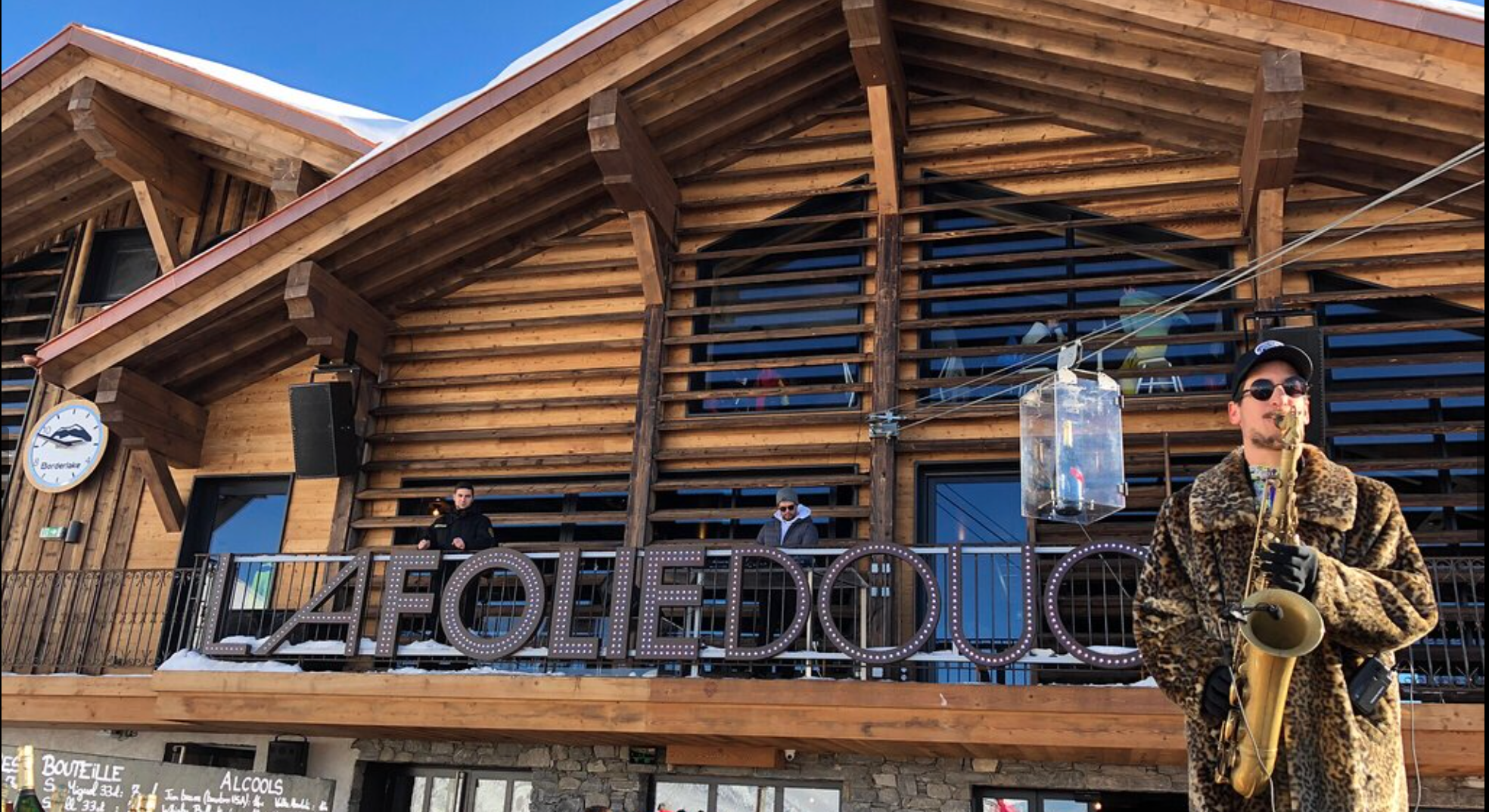 Saxophonist playing outside Folie Douce