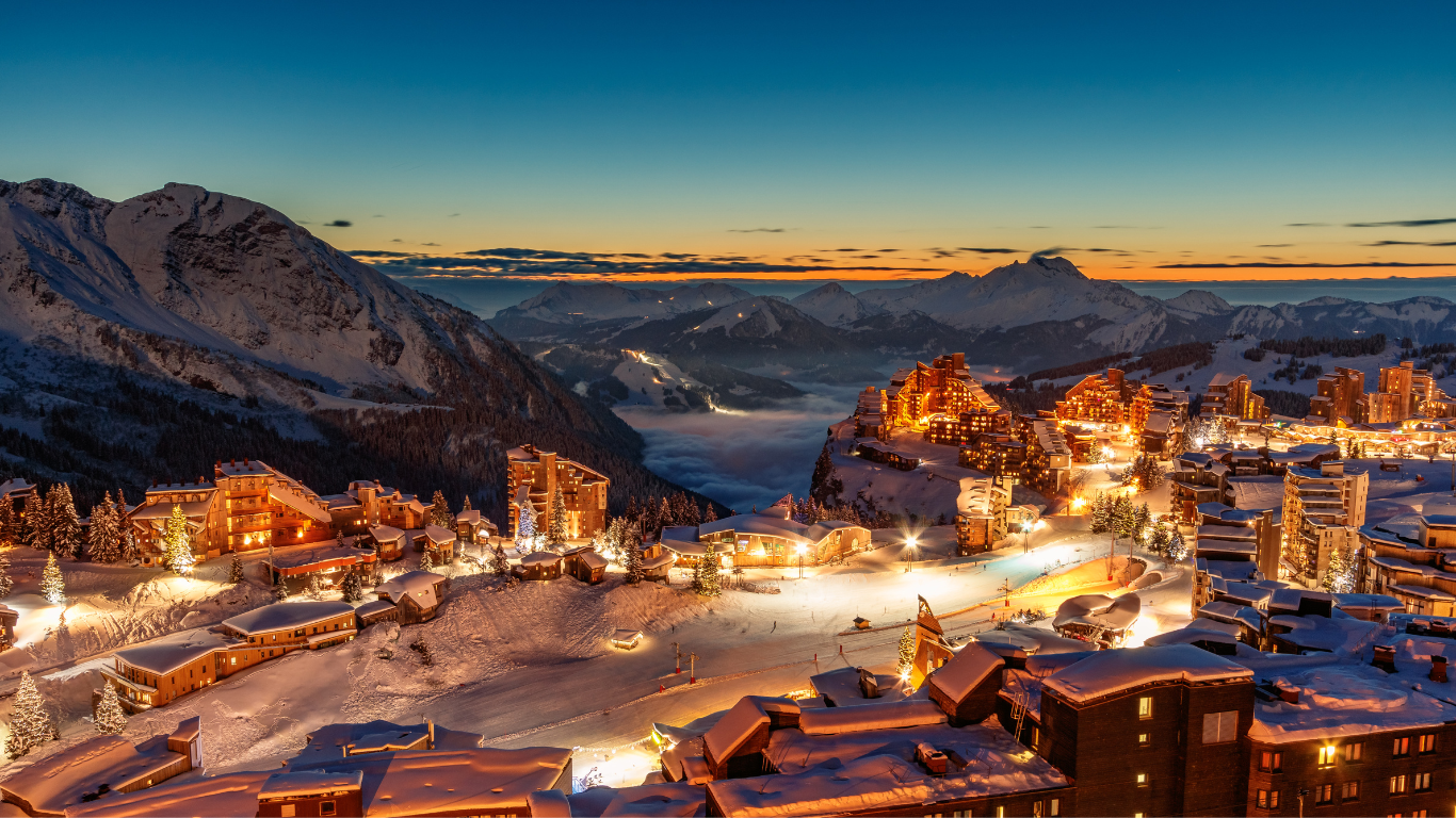 Avoriaz ski resort at night with lights from the chalets and hotels