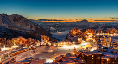 Avoriaz ski resort at night with lights from the chalets and hotels