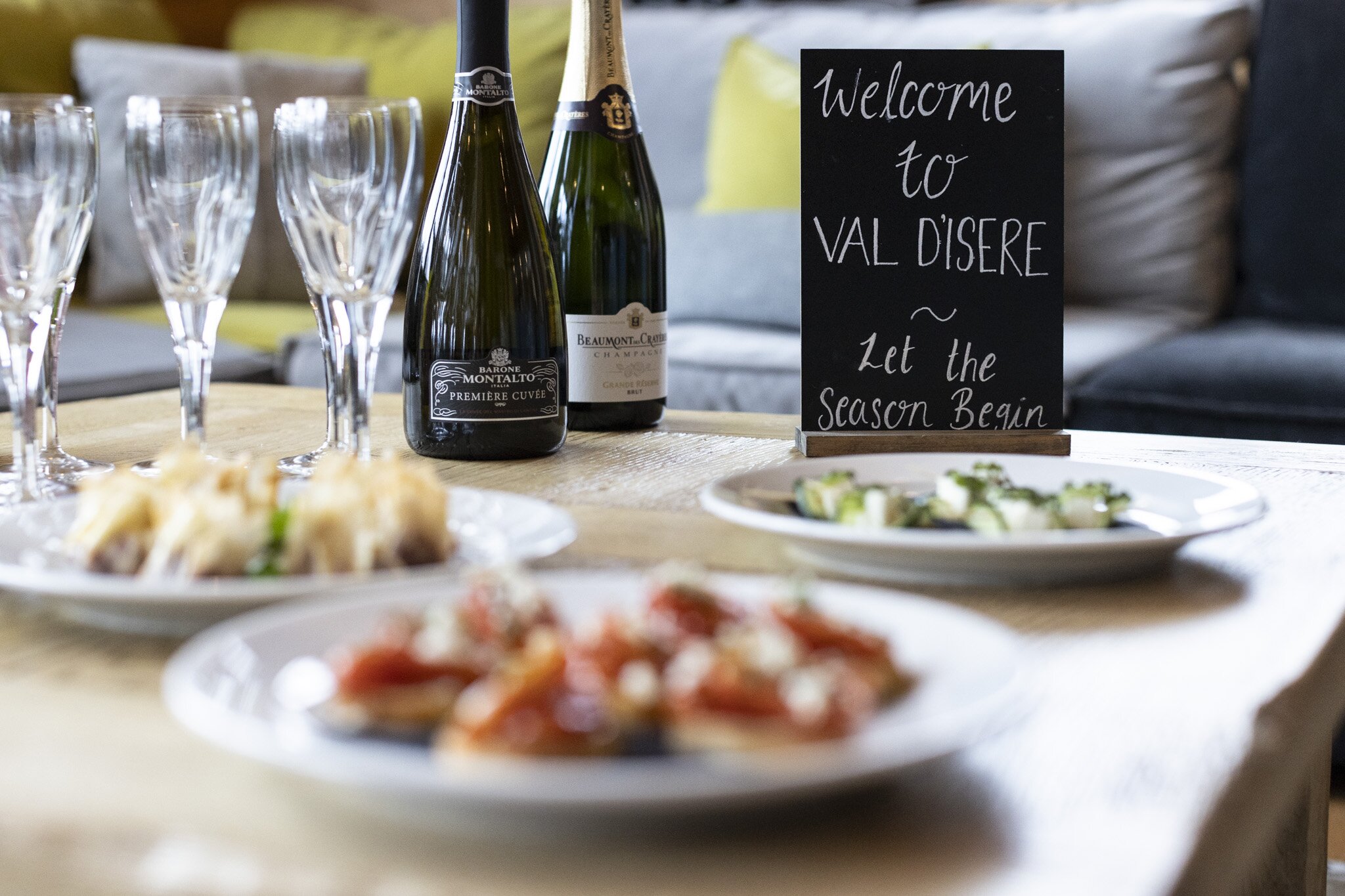 Champagne  and canapes on a chalet coffee table, No 1 Bellevarde, Val d'Isere