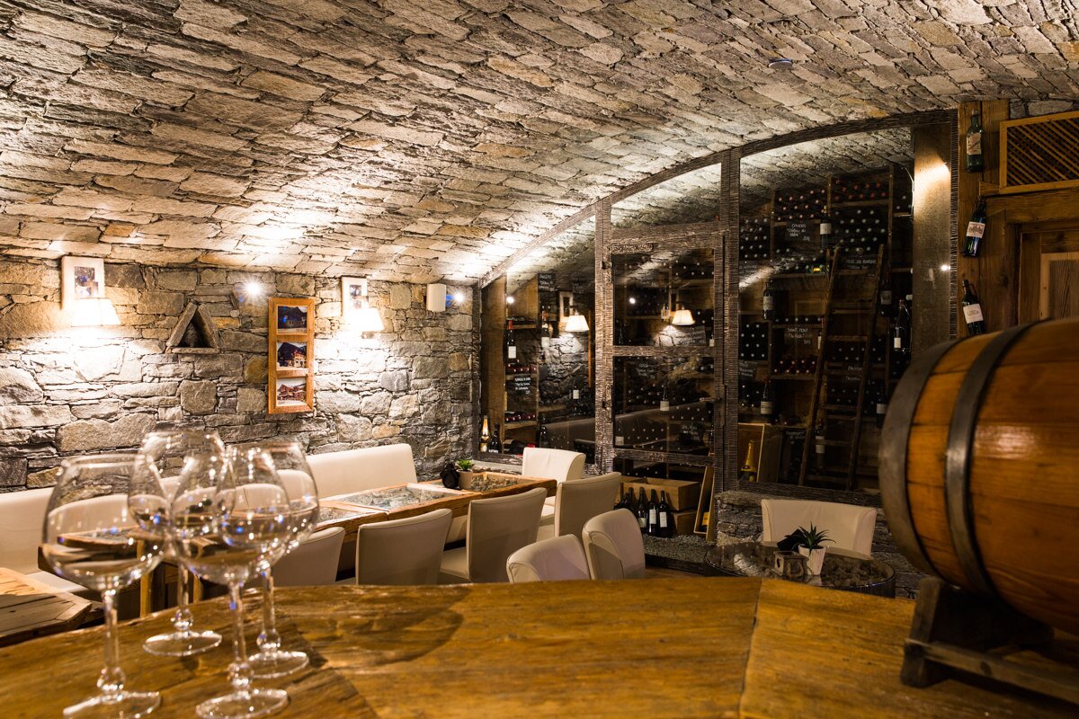Stone-clad downstairs wine bar