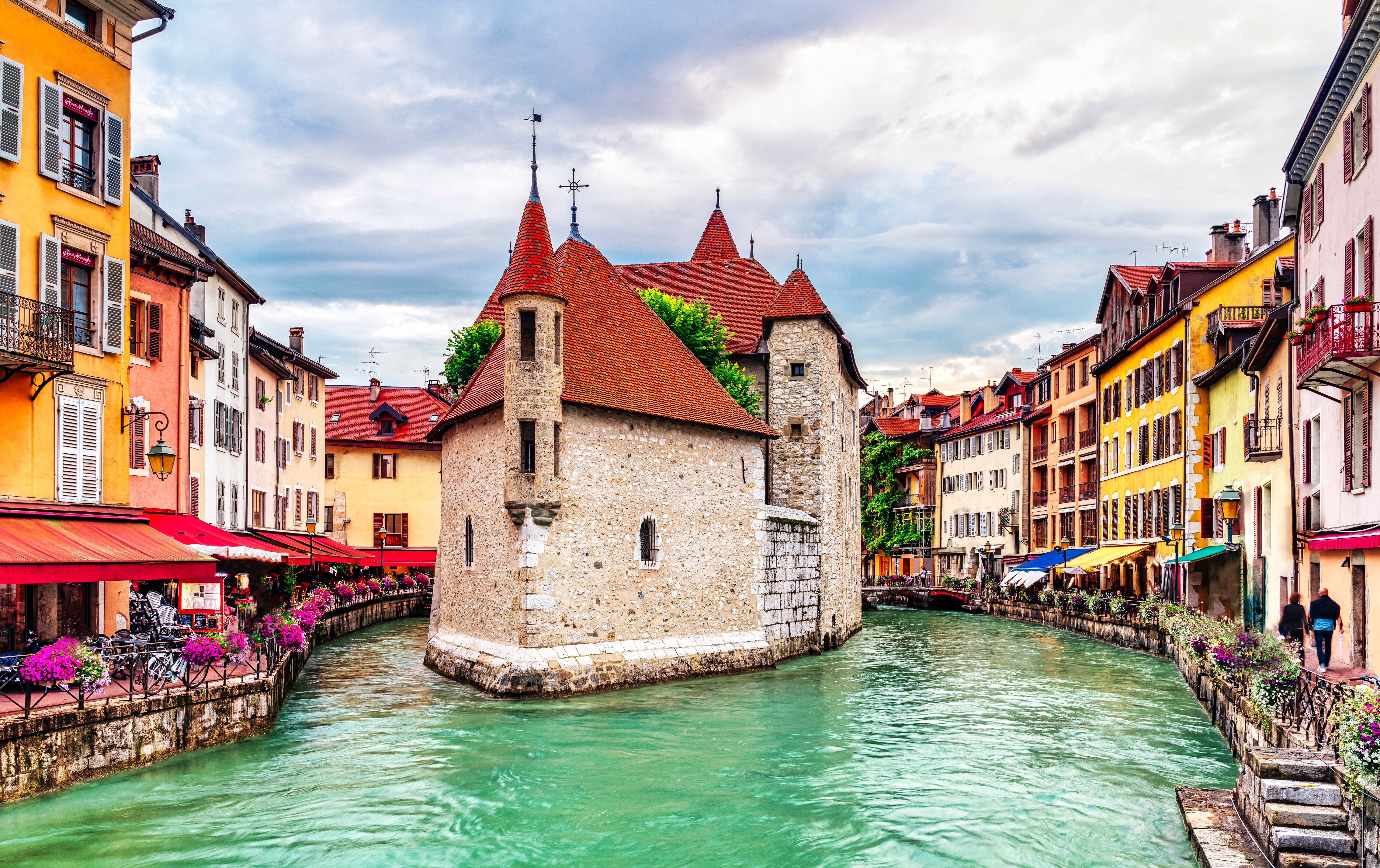 Canal and old stone building in the old part of Annecy