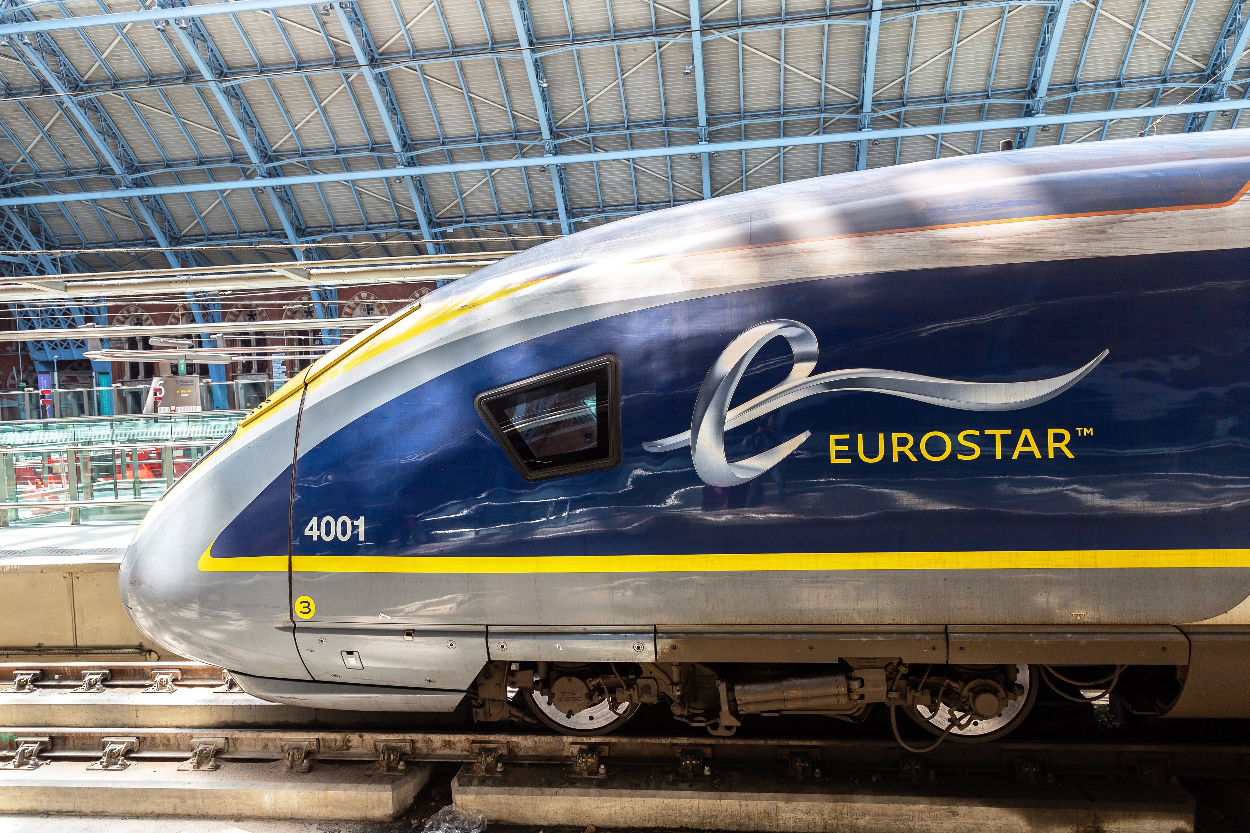 Blue, yellow and grey Eurostar train at the station