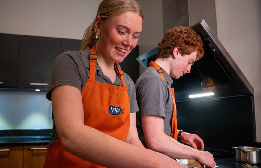 vip ski chalet hosts preparing food