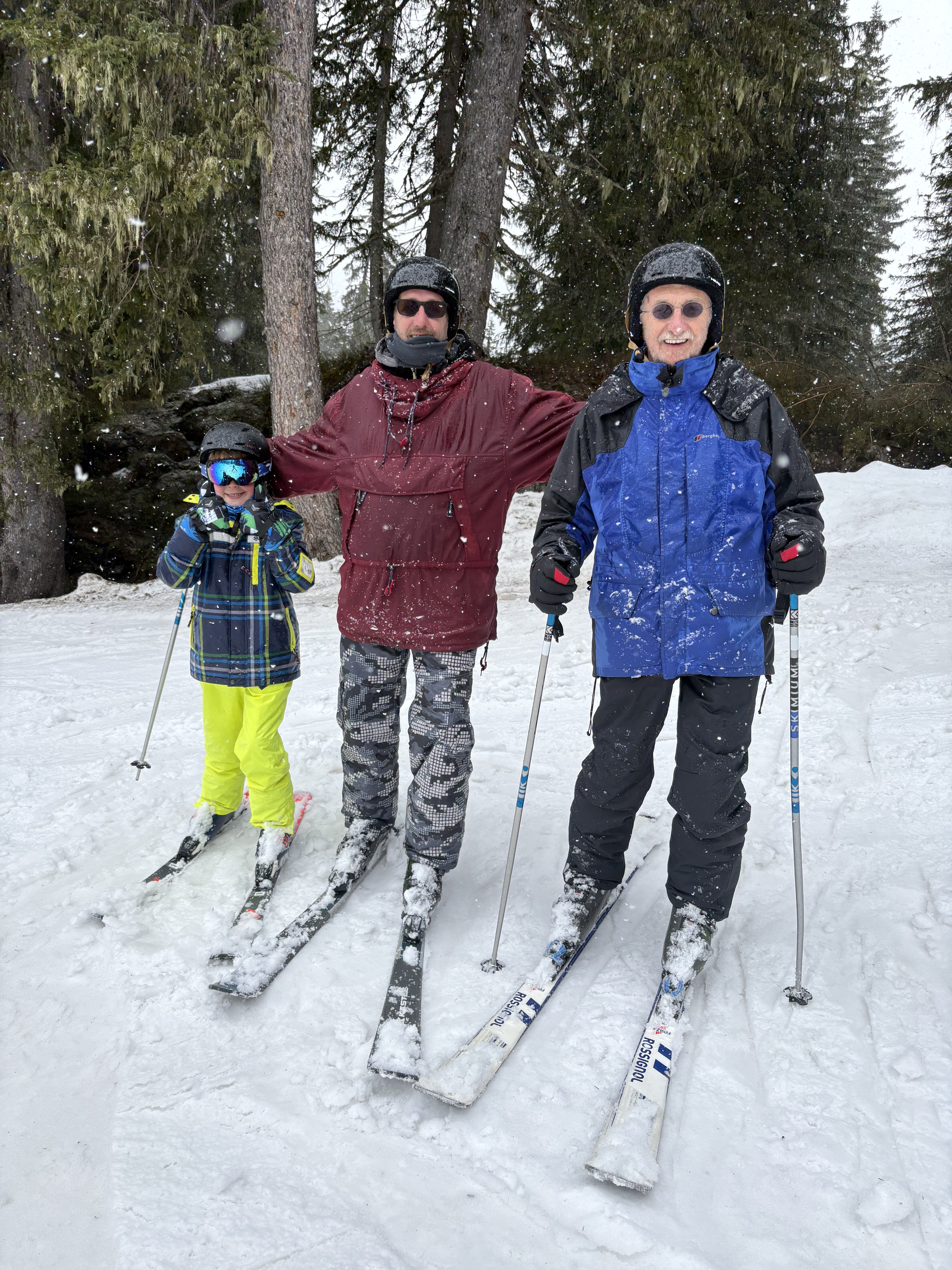 Three generations skiing