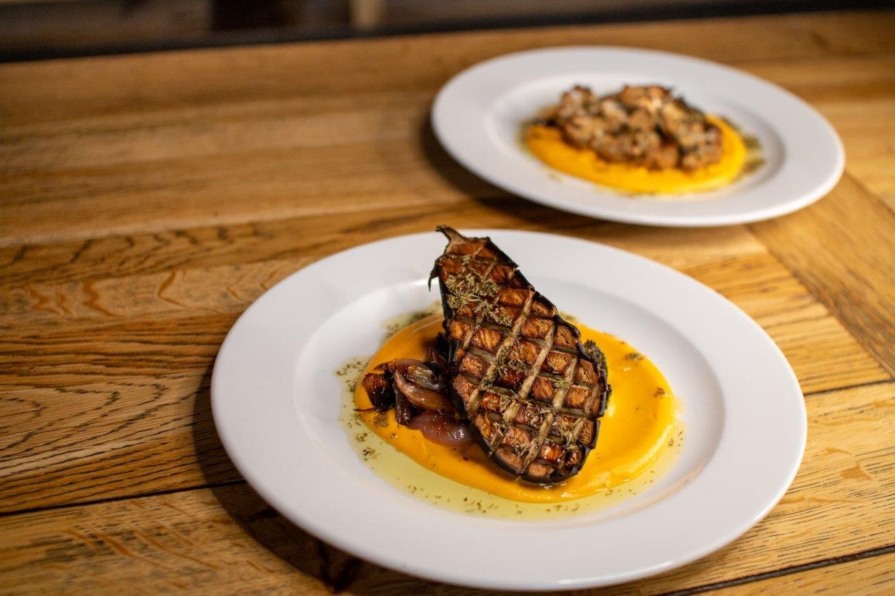 VIP SKI aubergine steak on bed of sweet potato puree and shallots