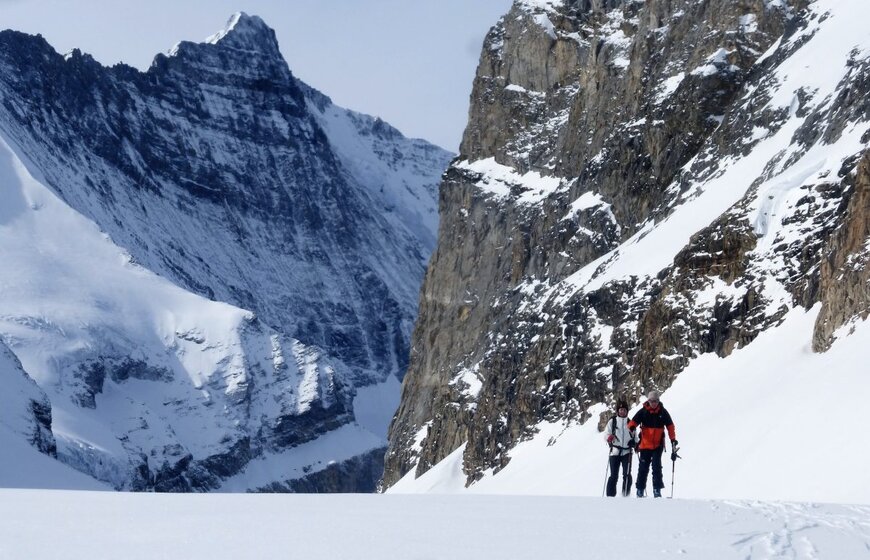 Henry and another skier skinning up the mountain