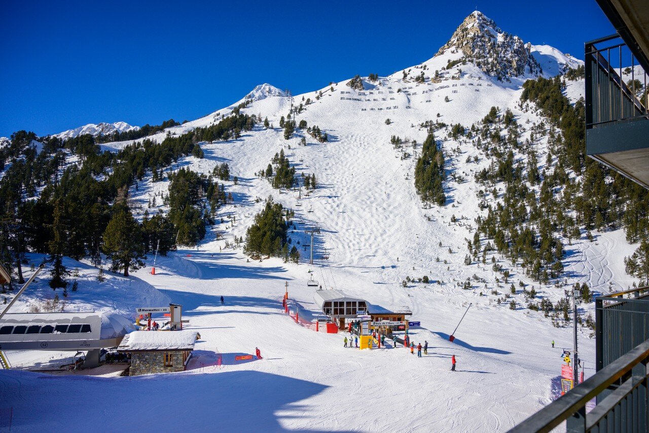 View of ski slopes and lifts from Bear Lodge ski hotel by VIP SKI in Arc 1950