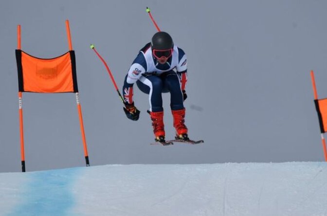 Skier Max Laughland getting air in GS race