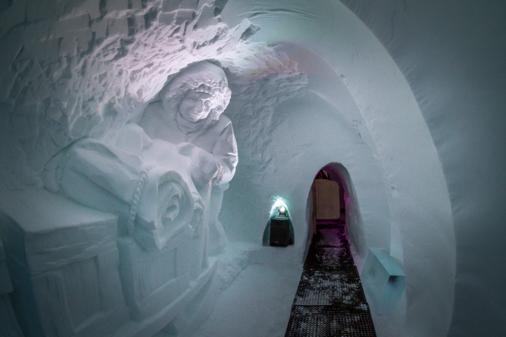 Igloo with snow carvings and a viewing walkway