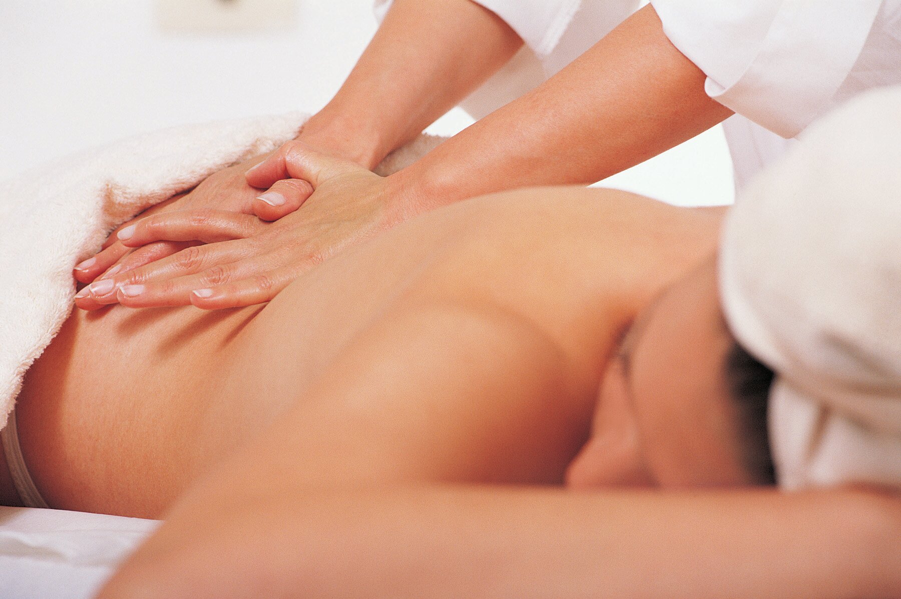 Woman having back massage