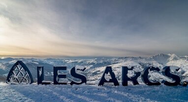 Les Arcs letters on side of piste