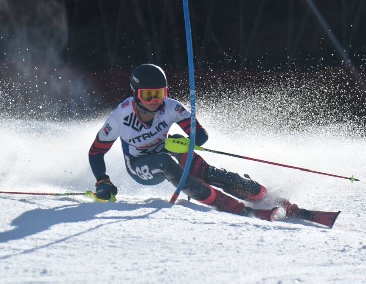 GB skier Max Laughland skiing around slalom pole