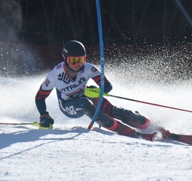 GB skier Max Laughland skiing around slalom pole